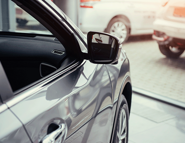 Side view of a modern silver luxury sedan, part of the premium vehicle fleet for Istanbul airport transfers.